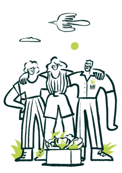 Tres personas con una caja de productos